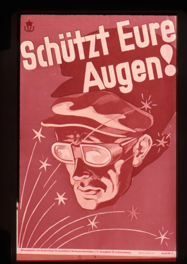 Ein altes Plakat, das für den Einsatz von Augenschutz wirbt.