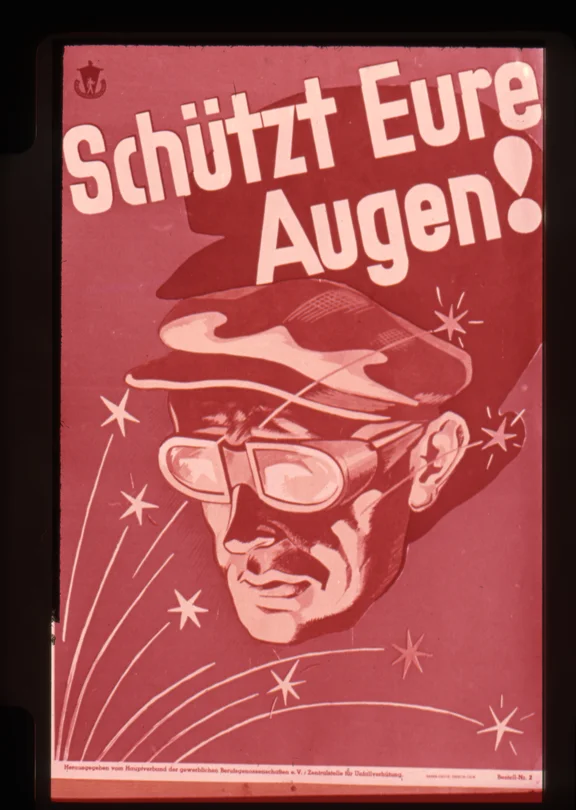 Ein altes Plakat, das für den Einsatz von Augenschutz wirbt.